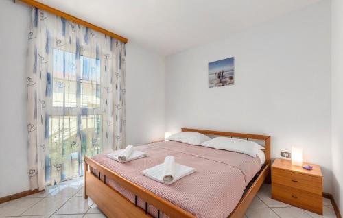 Posteľ alebo postele v izbe v ubytovaní Apartment Batana