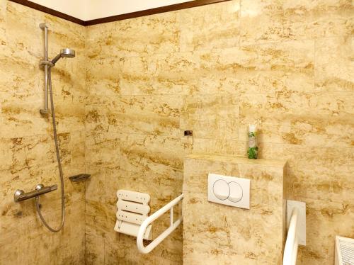 a bathroom with a shower and a sink at Orosz Gábor Vendégház Mád in Mád