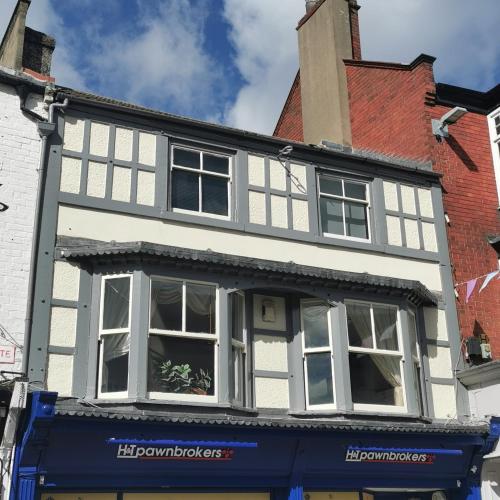 a white building with white windows on a street at House - Sleeps up to 14 & Parking Available in Darlington