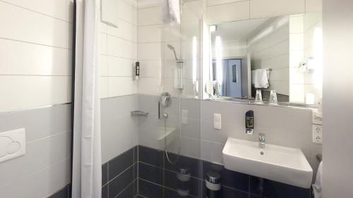 Koupelna v ubytování Hotel Zur Post