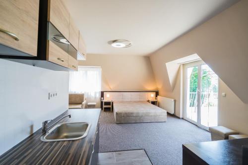 Postel nebo postele na pokoji v ubytování Beach Magánszállás