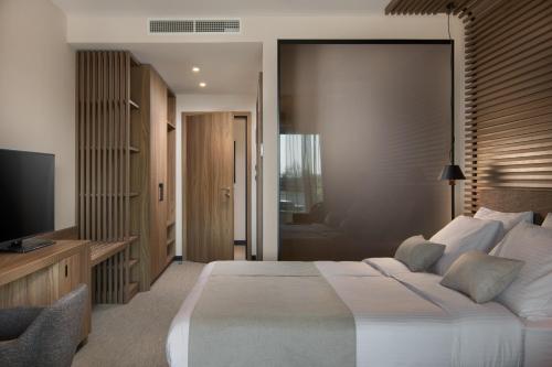 Katil atau katil-katil dalam bilik di San Servolo Wellness Rooms - Adults Only