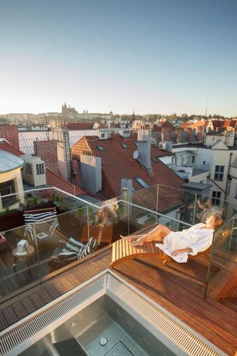 a view of a roof with people sleeping on the deck at The Emblem Prague Hotel - Preferred Hotels & Resorts in Prague