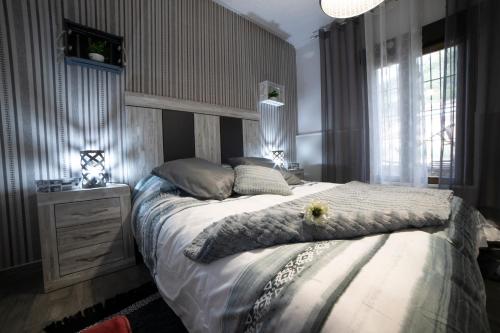 Ένα ή περισσότερα κρεβάτια σε δωμάτιο στο APARTAMENTO LA VEGUILLA