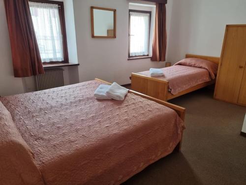 Katil atau katil-katil dalam bilik di Albergo Spina