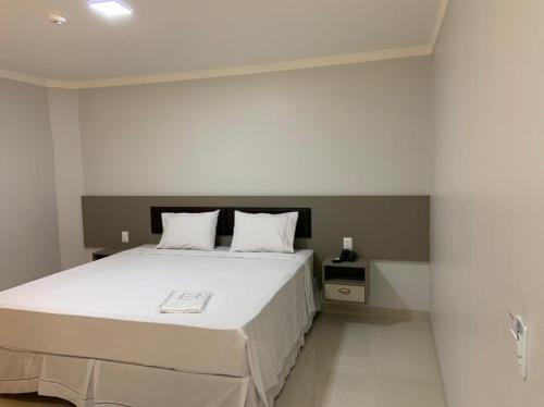 Cama ou camas em um quarto em Hotel Uipi