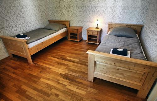 Postel nebo postele na pokoji v ubytování Chateau Děčín