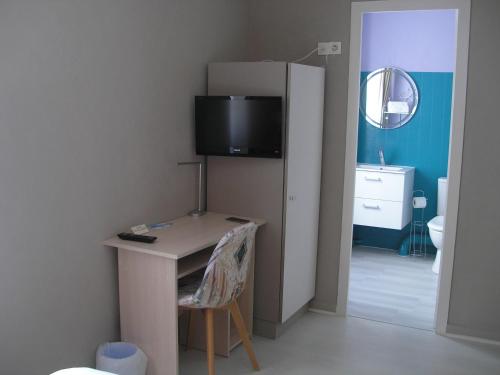 Μια τηλεόραση ή/και κέντρο ψυχαγωγίας στο Auberge du Calvaire