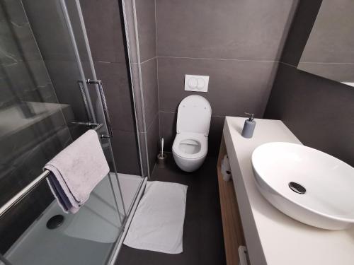 Koupelna v ubytování Cha Cha Rooms