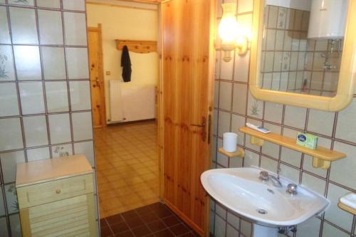 Vonios kambarys apgyvendinimo įstaigoje Intero appartamento in stile montagna