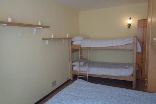 Postel nebo postele na pokoji v ubytování Intero appartamento in stile montagna