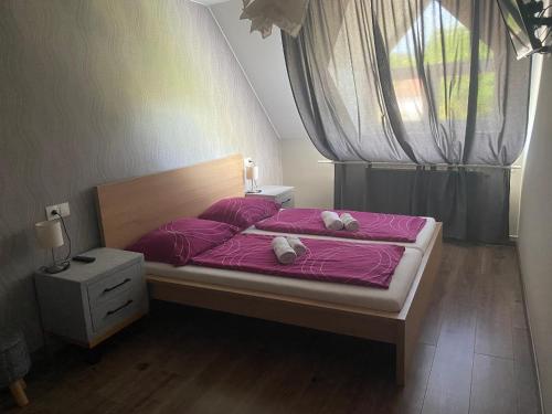 Кровать или кровати в номере Oázis Panzió
