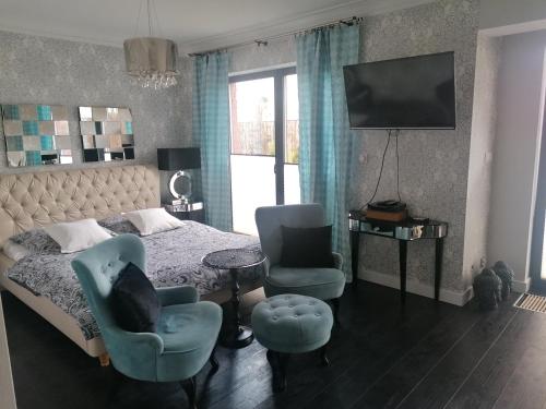 Χώρος καθιστικού στο Apartamenty De Soleil