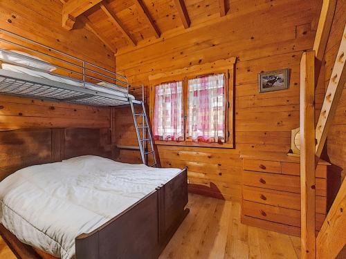 Voodi või voodid majutusasutuse CHALET-MORZINE-6 a 18 PERSONNES-SAUNA -PROCHE NAVETTE et BOULANGERIE-MANUPA CLEVIE toas