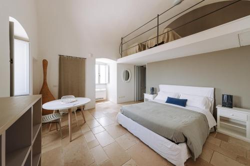 Ein Bett oder Betten in einem Zimmer der Unterkunft Masseria Garrappa