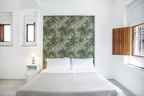 Letto o letti in una camera di Euphorbia Apartments by Wonderful Italy