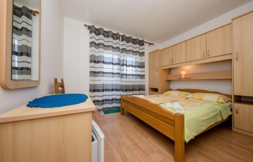 Posteľ alebo postele v izbe v ubytovaní Rooms Marijana