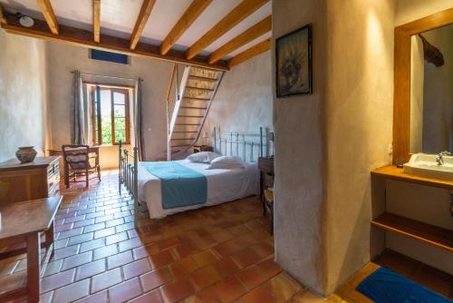 Postel nebo postele na pokoji v ubytování Maison d'Hôtes Mas de la Chadenede
