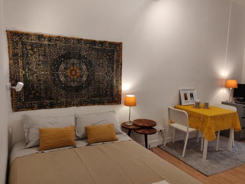 Ein Bett oder Betten in einem Zimmer der Unterkunft Bhappy@home Lisboa