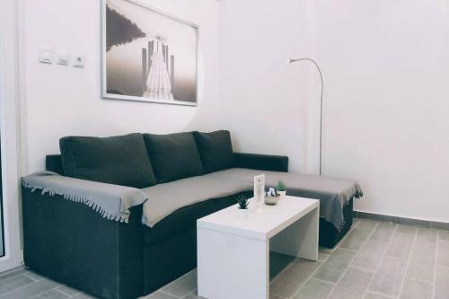 Χώρος καθιστικού στο Deluxe Apartment by Prima Lodging