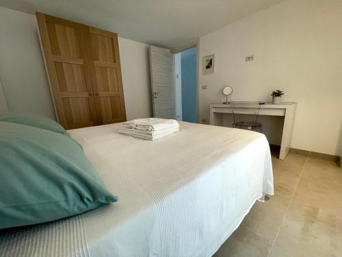 Postel nebo postele na pokoji v ubytování Eos Sea View Apartments