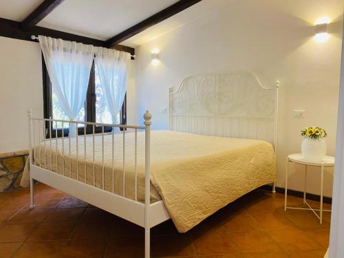 Katil atau katil-katil dalam bilik di Villa Anita