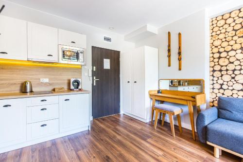 Η κουζίνα ή μικρή κουζίνα στο Pałac Tatrzański Apartamenty