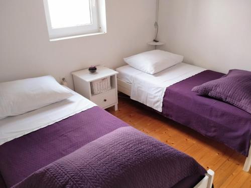 Posteľ alebo postele v izbe v ubytovaní Cheerful two bedroom cottage with panoramic view in Celina