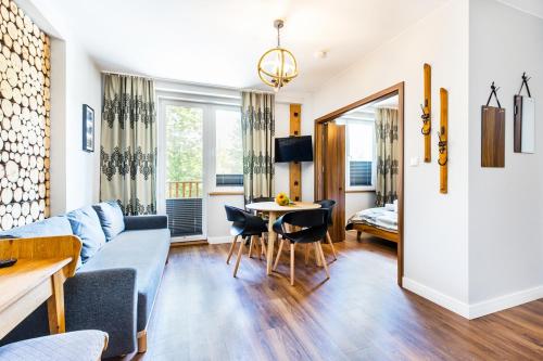 Χώρος καθιστικού στο Pałac Tatrzański Apartamenty