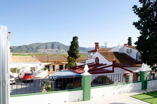 a view of the town from the balcony of a house at Zapata Home in Alhaurín de la Torre