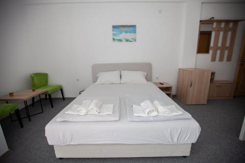 Vinarija "Đelmo" apartments tesisinde bir odada yatak veya yataklar