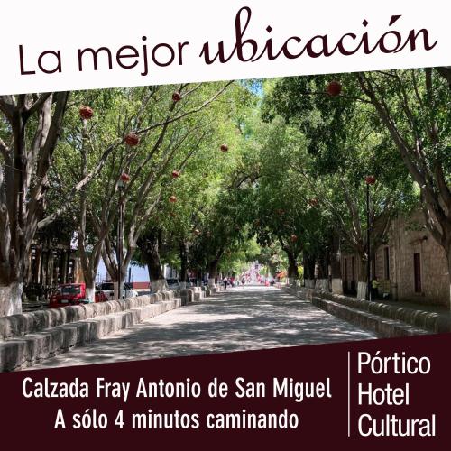 a street lined with trees in a city at Pórtico Hotel & Galería in Morelia