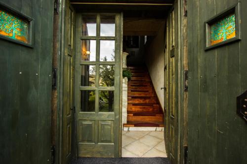 an entrance to a house with a door and stairs at Vila Terrasse in Košice