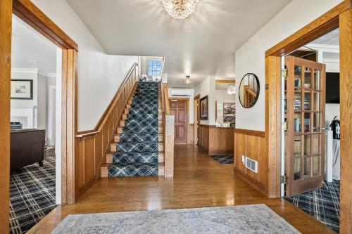 a hallway of a home with a stairway at Saratoga Inn in Langley