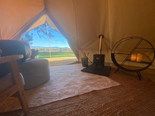 a room with a tent with a view of a field at Mansfield Glamping - ADULTS ONLY in Mansfield