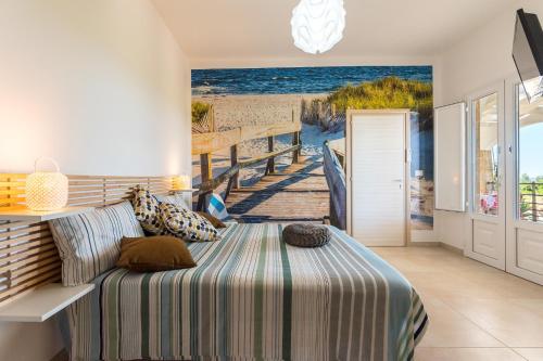 A bed or beds in a room at Tramontana Tre Archi B&B