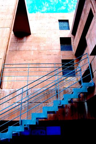 a set of blue stairs in a building at SEKIYA RESORT Galleria Midobaru in Beppu