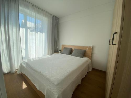 Katil atau katil-katil dalam bilik di LagoonView Apartment at Kalno namai