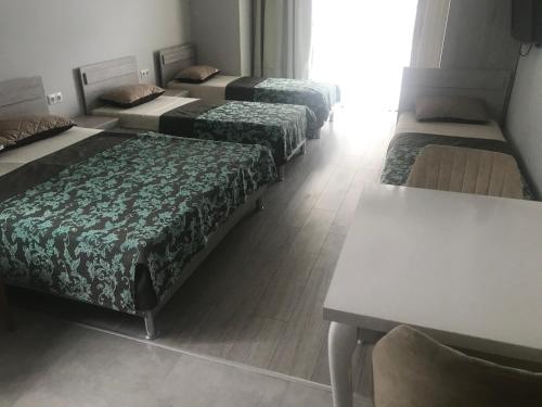 Postel nebo postele na pokoji v ubytování Guesthouse Data