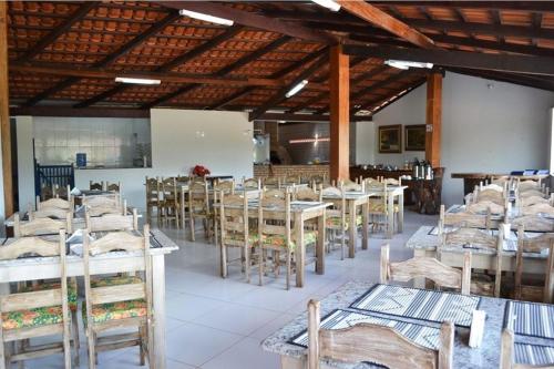 Reštaurácia alebo iné gastronomické zariadenie v ubytovaní Pousada Miosotis