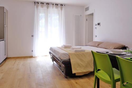 Cama o camas de una habitación en Appartamenti Alle 5 Torri