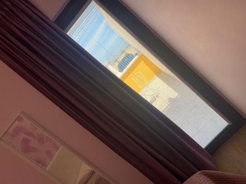 Una cama o camas en una habitación de Traiano Suite