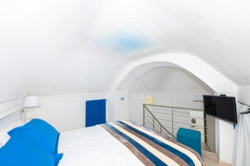 Säng eller sängar i ett rum på YourHome - Casa Barba Positano