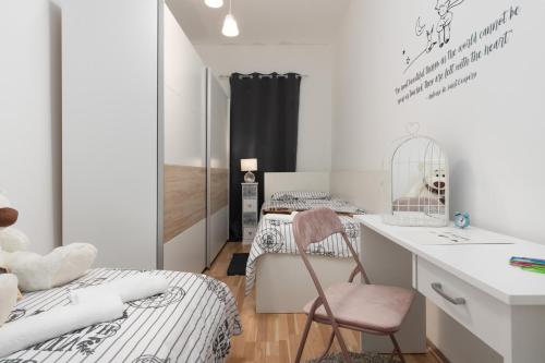 Postel nebo postele na pokoji v ubytování Lento Apartment