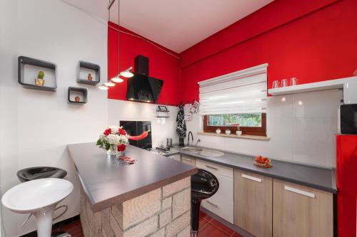 Kuchyň nebo kuchyňský kout v ubytování Lento Apartment