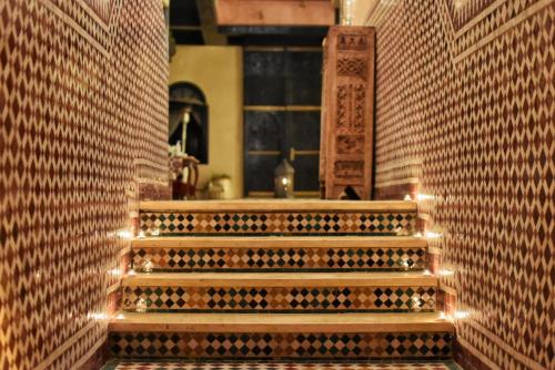 a row of stairs leading up to a stair case at Riad Yacout in Meknès
