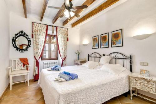 A bed or beds in a room at Casa Maria Angela