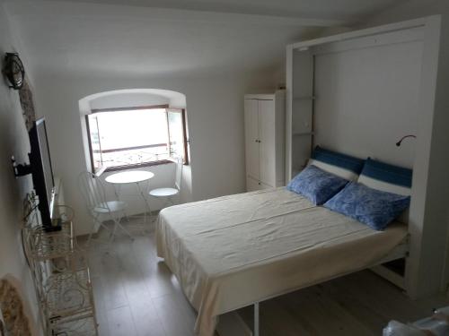 Postel nebo postele na pokoji v ubytování Passione Mare