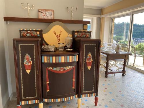 a room with two cupcakes on a shelf at The Splendid View - 8 Personnes in Bouillon