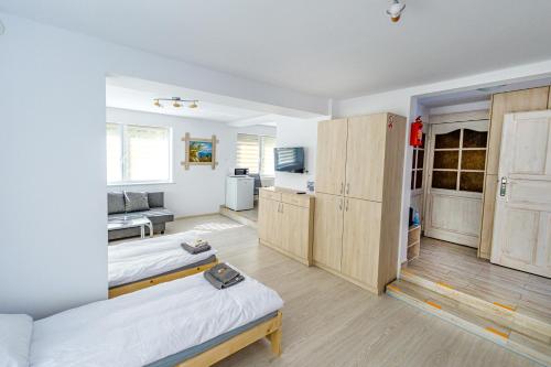 Kuchyňa alebo kuchynka v ubytovaní Stara Piekarnia - Plac Lotników